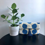 Beautiful ikat blue doted clutch bag with tassel