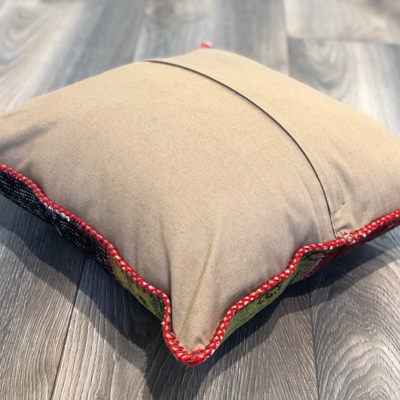 Beige cotton backside of patchwork pillow with hidden zipper