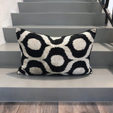 Velvet Ikat Pillow Ogee Black on stairs