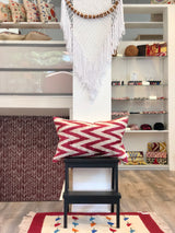 Velvet Ikat Pillow Zigzag Red on table