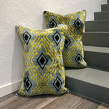Velvet Ikat Pillow Yellow Vibes on stairs