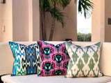 Velvet Ikat Cushion Miami Vice on sofa
