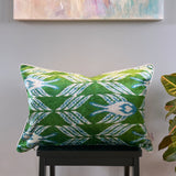 Velvet Ikat Pillow Green Planet | on table