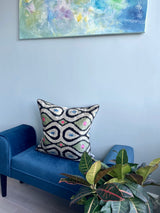 Velvet Ikat Cushion Evolution | on sofa