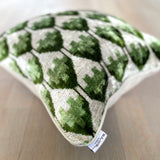 Velvet Ikat Cushion Green Energy | Close angle view