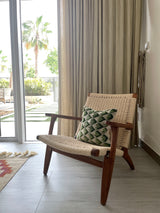 Velvet Ikat Cushion Green Energy | On chair