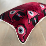 Velvet Ikat Pillow Hamsa | Upper side angle view