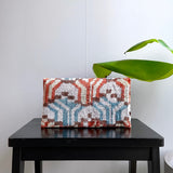 Chic ikat clutch bag in handloomed fabric