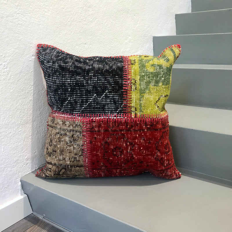Black, lime, beige, red wool pillow cover in patchwork style