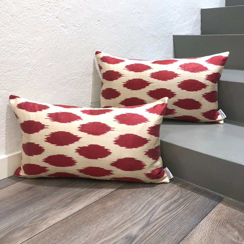 Geometric patterned cushion cover in red color
