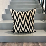 Velvet Ikat Cushion Zigzag Black on stairs