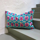 Velvet Ikat Pillow Happy on stairs