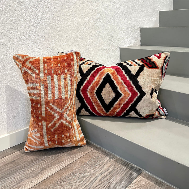 Velvet Ikat Pillow Boho with another pillow on stairs